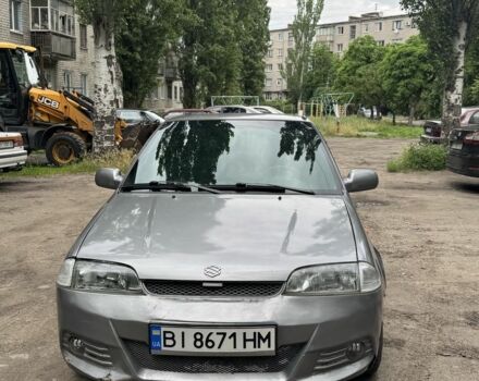 Серый Сузуки Свифт, объемом двигателя 1.3 л и пробегом 400 тыс. км за 1150 $, фото 1 на Automoto.ua
