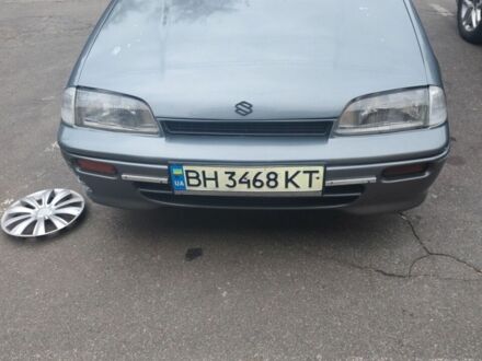Серый Сузуки Свифт, объемом двигателя 1.3 л и пробегом 350 тыс. км за 1800 $, фото 1 на Automoto.ua