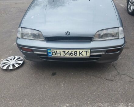 Сірий Сузукі Свифт, об'ємом двигуна 1.3 л та пробігом 350 тис. км за 1800 $, фото 1 на Automoto.ua