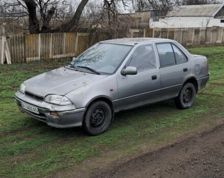 Сірий Сузукі Свифт, об'ємом двигуна 1.3 л та пробігом 220 тис. км за 339 $, фото 1 на Automoto.ua