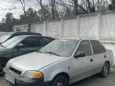 Серый Сузуки Свифт, объемом двигателя 1.3 л и пробегом 222 тыс. км за 550 $, фото 1 на Automoto.ua