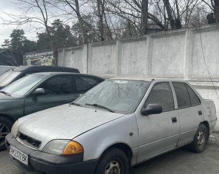 Серый Сузуки Свифт, объемом двигателя 1.3 л и пробегом 222 тыс. км за 550 $, фото 1 на Automoto.ua