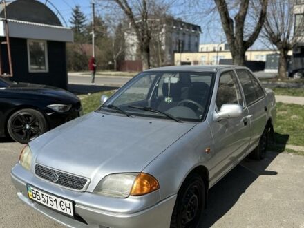 Серый Сузуки Свифт, объемом двигателя 1.3 л и пробегом 200 тыс. км за 650 $, фото 1 на Automoto.ua