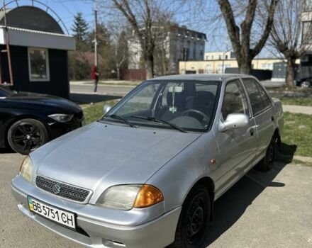 Серый Сузуки Свифт, объемом двигателя 1.3 л и пробегом 200 тыс. км за 650 $, фото 1 на Automoto.ua