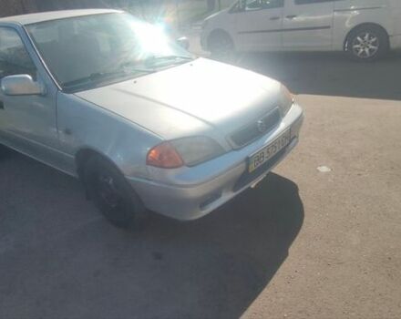 Сірий Сузукі Свифт, об'ємом двигуна 1.3 л та пробігом 230 тис. км за 1000 $, фото 1 на Automoto.ua