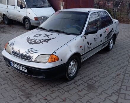 Сірий Сузукі Свифт, об'ємом двигуна 1.3 л та пробігом 111 тис. км за 1300 $, фото 1 на Automoto.ua