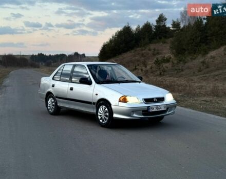 Серый Сузуки Свифт, объемом двигателя 1.3 л и пробегом 200 тыс. км за 1450 $, фото 1 на Automoto.ua