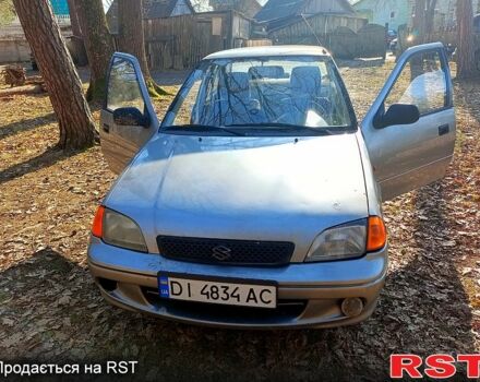 Серый Сузуки Свифт, объемом двигателя 1.3 л и пробегом 160 тыс. км за 1500 $, фото 1 на Automoto.ua