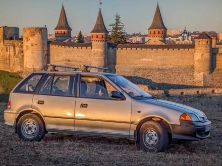 Сузуки Свифт 2003 в Каменце-Подольском на Automoto.ua Серый Сузуки Свифт, объемом двигателя 1.3 л и пробегом 233 тыс. км за 1540 $, фото 1 на Automoto.ua