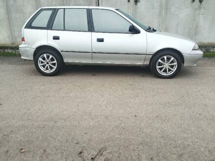 Серый Сузуки Свифт, объемом двигателя 1.3 л и пробегом 196 тыс. км за 1900 $, фото 1 на Automoto.ua