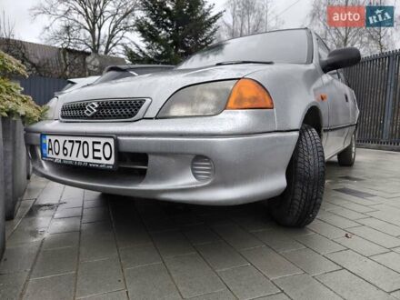 Серый Сузуки Свифт, объемом двигателя 1.3 л и пробегом 56 тыс. км за 2550 $, фото 1 на Automoto.ua