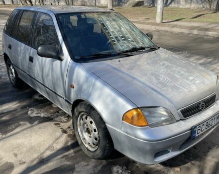 Серый Сузуки Свифт, объемом двигателя 1.3 л и пробегом 260 тыс. км за 1700 $, фото 1 на Automoto.ua