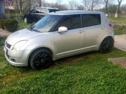 Серый Сузуки Свифт, объемом двигателя 1.33 л и пробегом 221 тыс. км за 5000 $, фото 1 на Automoto.ua