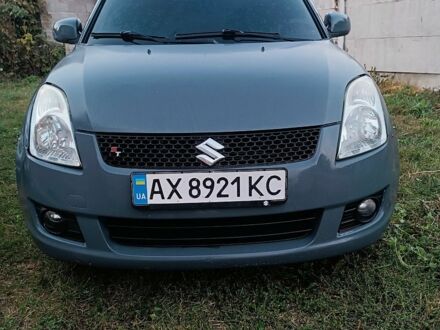 Серый Сузуки Свифт, объемом двигателя 1.32 л и пробегом 320 тыс. км за 3700 $, фото 1 на Automoto.ua
