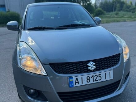 Сірий Сузукі Свифт, об'ємом двигуна 1.3 л та пробігом 217 тис. км за 5500 $, фото 1 на Automoto.ua