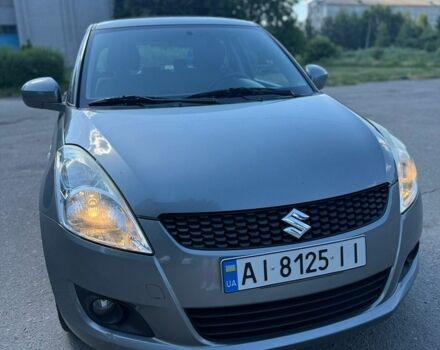 Сірий Сузукі Свифт, об'ємом двигуна 1.3 л та пробігом 217 тис. км за 5800 $, фото 1 на Automoto.ua