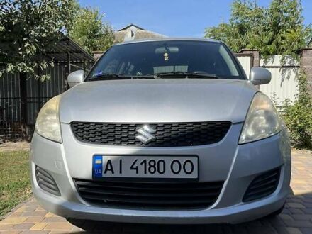 Сузукі Свифт 2011 у Києві на Automoto.ua Сірий Сузукі Свифт, об'ємом двигуна 1.24 л та пробігом 250 тис. км за 5500 $, фото 1 на Automoto.ua