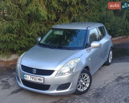 Сірий Сузукі Свифт, об'ємом двигуна 1.2 л та пробігом 238 тис. км за 5900 $, фото 1 на Automoto.ua