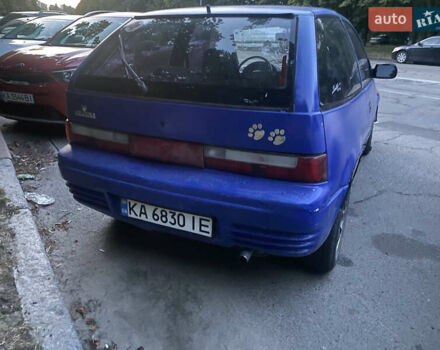 Синий Сузуки Свифт, объемом двигателя 1 л и пробегом 296 тыс. км за 1000 $, фото 1 на Automoto.ua