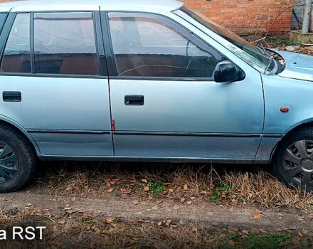 Синий Сузуки Свифт, объемом двигателя 1.3 л и пробегом 160 тыс. км за 750 $, фото 1 на Automoto.ua