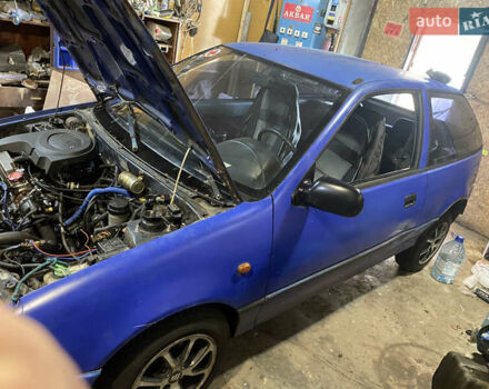 Синий Сузуки Свифт, объемом двигателя 1 л и пробегом 296 тыс. км за 1000 $, фото 6 на Automoto.ua