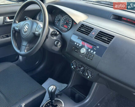 Синій Сузукі Свифт, об'ємом двигуна 1.3 л та пробігом 106 тис. км за 5999 $, фото 14 на Automoto.ua