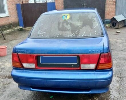 Синий Сузуки Свифт, объемом двигателя 1.3 л и пробегом 91 тыс. км за 1400 $, фото 2 на Automoto.ua