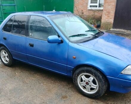 Синий Сузуки Свифт, объемом двигателя 1.3 л и пробегом 91 тыс. км за 1400 $, фото 1 на Automoto.ua