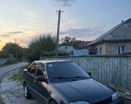 Синий Сузуки Свифт, объемом двигателя 1.3 л и пробегом 250 тыс. км за 1200 $, фото 1 на Automoto.ua