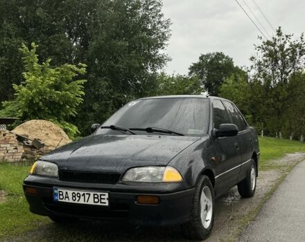 Синий Сузуки Свифт, объемом двигателя 1.3 л и пробегом 250 тыс. км за 1200 $, фото 2 на Automoto.ua