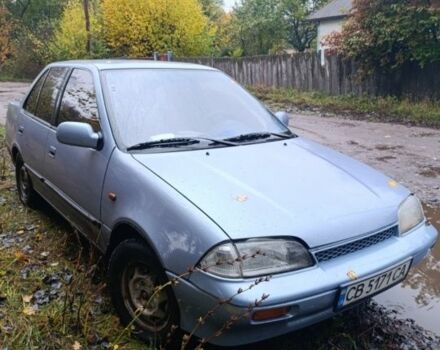 Синий Сузуки Свифт, объемом двигателя 1.3 л и пробегом 150 тыс. км за 834 $, фото 2 на Automoto.ua