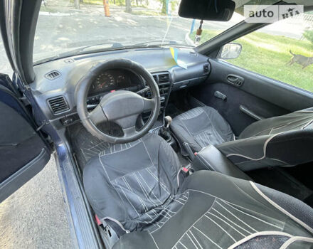 Синий Сузуки Свифт, объемом двигателя 1.3 л и пробегом 255 тыс. км за 1100 $, фото 4 на Automoto.ua