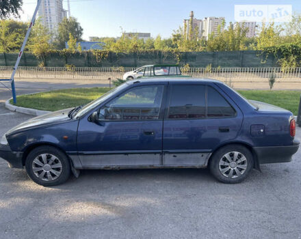 Синий Сузуки Свифт, объемом двигателя 1.3 л и пробегом 255 тыс. км за 1100 $, фото 1 на Automoto.ua