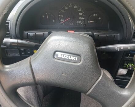 Синий Сузуки Свифт, объемом двигателя 1.3 л и пробегом 150 тыс. км за 834 $, фото 9 на Automoto.ua