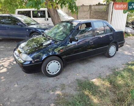 Синий Сузуки Свифт, объемом двигателя 1.59 л и пробегом 97 тыс. км за 2300 $, фото 1 на Automoto.ua
