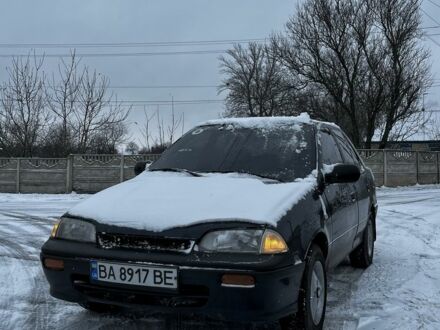 Синий Сузуки Свифт, объемом двигателя 1.3 л и пробегом 250 тыс. км за 1200 $, фото 1 на Automoto.ua