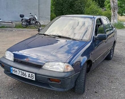 Синий Сузуки Свифт, объемом двигателя 1.3 л и пробегом 270 тыс. км за 350 $, фото 1 на Automoto.ua