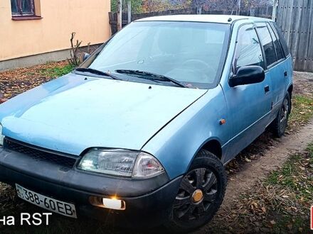 Синий Сузуки Свифт, объемом двигателя 1.3 л и пробегом 160 тыс. км за 750 $, фото 1 на Automoto.ua