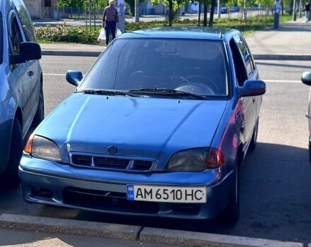 Синий Сузуки Свифт, объемом двигателя 1 л и пробегом 200 тыс. км за 1250 $, фото 1 на Automoto.ua