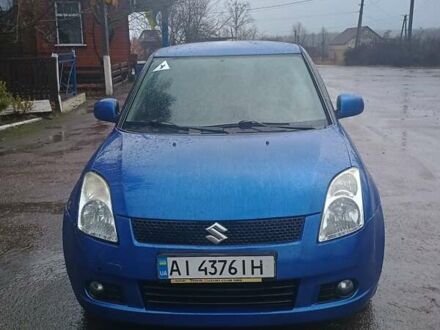 Синий Сузуки Свифт, объемом двигателя 1.49 л и пробегом 233 тыс. км за 6100 $, фото 1 на Automoto.ua