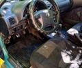 Зелений Сузукі Свифт, об'ємом двигуна 1 л та пробігом 315 тис. км за 1000 $, фото 1 на Automoto.ua