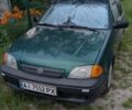 Зеленый Сузуки Свифт, объемом двигателя 1 л и пробегом 180 тыс. км за 1192 $, фото 1 на Automoto.ua