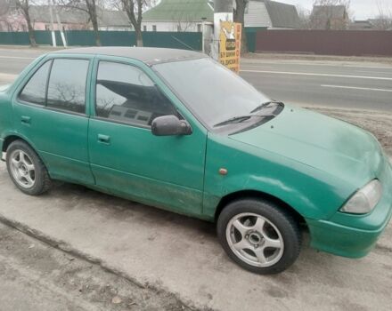 Зелений Сузукі Свифт, об'ємом двигуна 1.3 л та пробігом 300 тис. км за 850 $, фото 2 на Automoto.ua