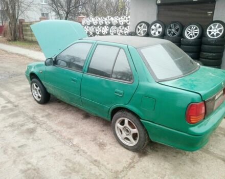 Зелений Сузукі Свифт, об'ємом двигуна 1.3 л та пробігом 300 тис. км за 850 $, фото 6 на Automoto.ua