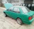 Зелений Сузукі Свифт, об'ємом двигуна 1.3 л та пробігом 300 тис. км за 850 $, фото 6 на Automoto.ua