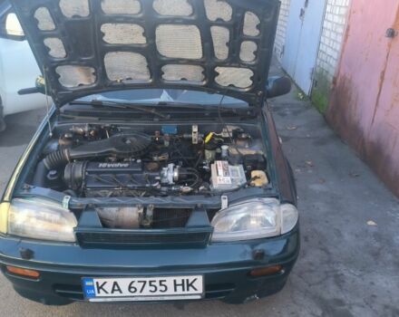 Зеленый Сузуки Свифт, объемом двигателя 1.6 л и пробегом 70 тыс. км за 850 $, фото 8 на Automoto.ua