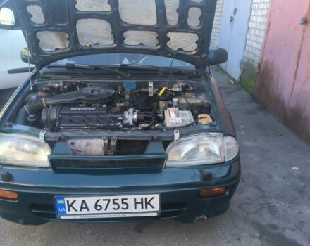 Зеленый Сузуки Свифт, объемом двигателя 1.6 л и пробегом 70 тыс. км за 850 $, фото 7 на Automoto.ua