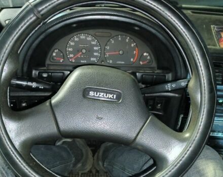 Зеленый Сузуки Свифт, объемом двигателя 1.6 л и пробегом 70 тыс. км за 850 $, фото 10 на Automoto.ua