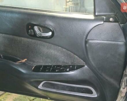 Зеленый Сузуки Свифт, объемом двигателя 1.6 л и пробегом 70 тыс. км за 850 $, фото 11 на Automoto.ua