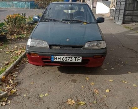 Зелений Сузукі Свифт, об'ємом двигуна 1.3 л та пробігом 427 тис. км за 700 $, фото 1 на Automoto.ua